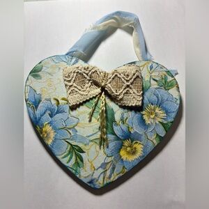 Heart-Shaped Floral Wall Hanging with Crochet Bow